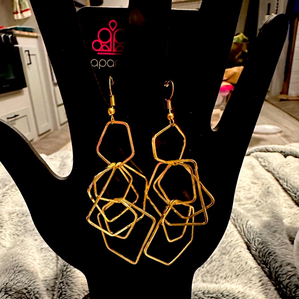 Gold fish hook earrings. Big statement style